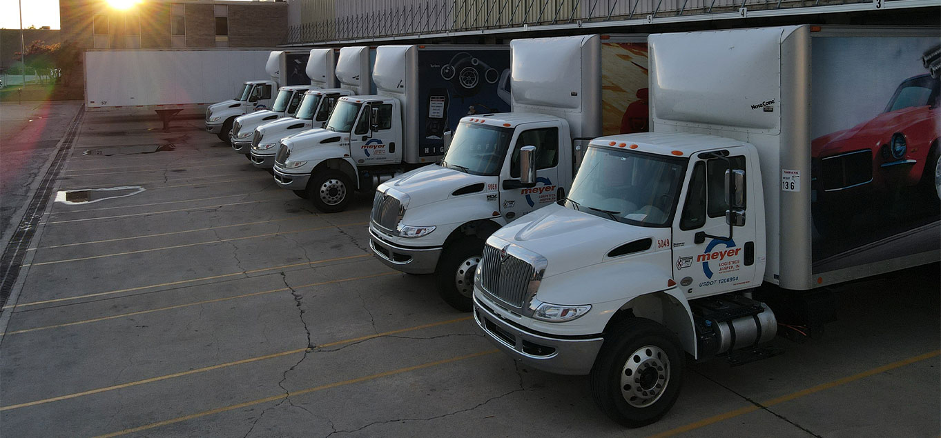 Meyer trucks docked at a Meyer warehouse
