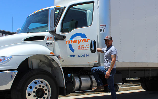 Meyer employee with a Meyer truck