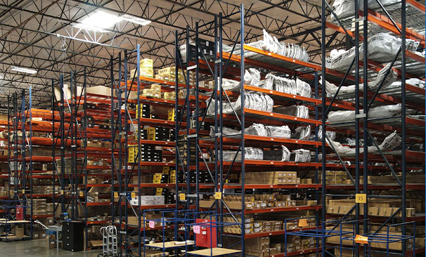Car parts stored on racks in a warehouse